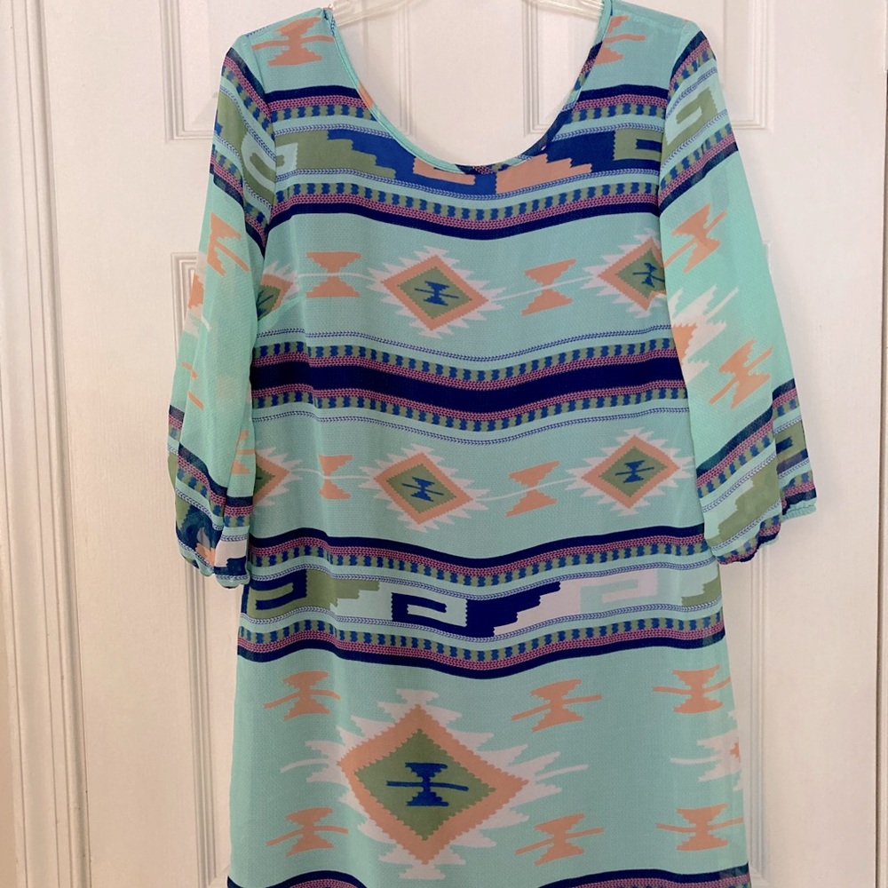 Patterned dress with bow